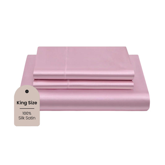 Mush pink satin pillows - complements elegant bedroom design